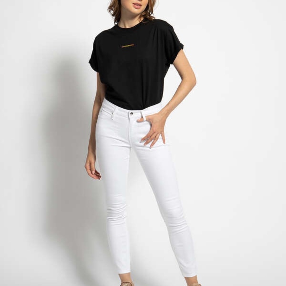 White calvin klein jeans